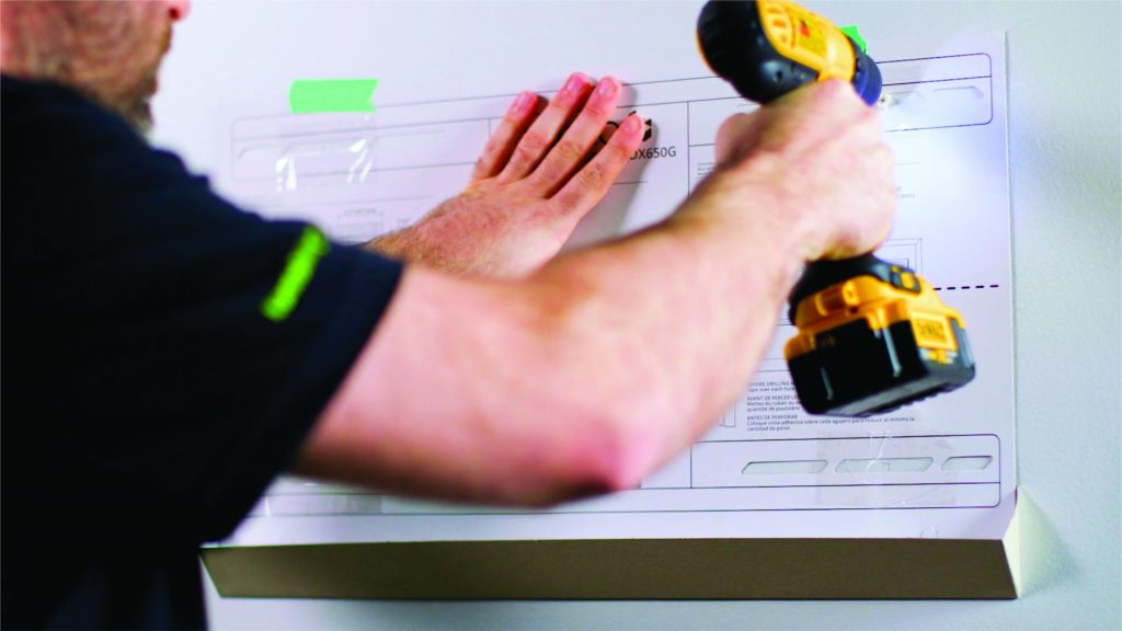 Drilling a hole for a TV wall mount